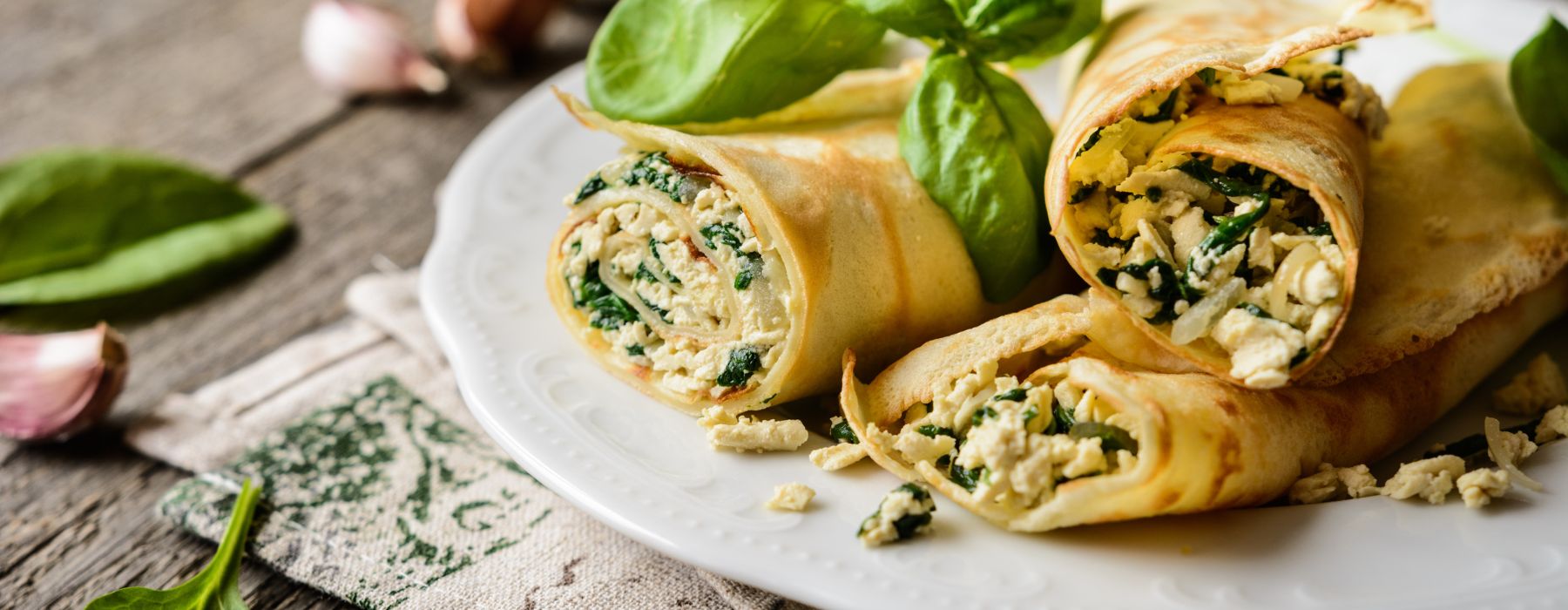 млинці з сиром і шпинатом