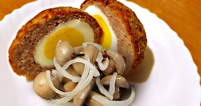 Яйце по-шотландськи з грибами